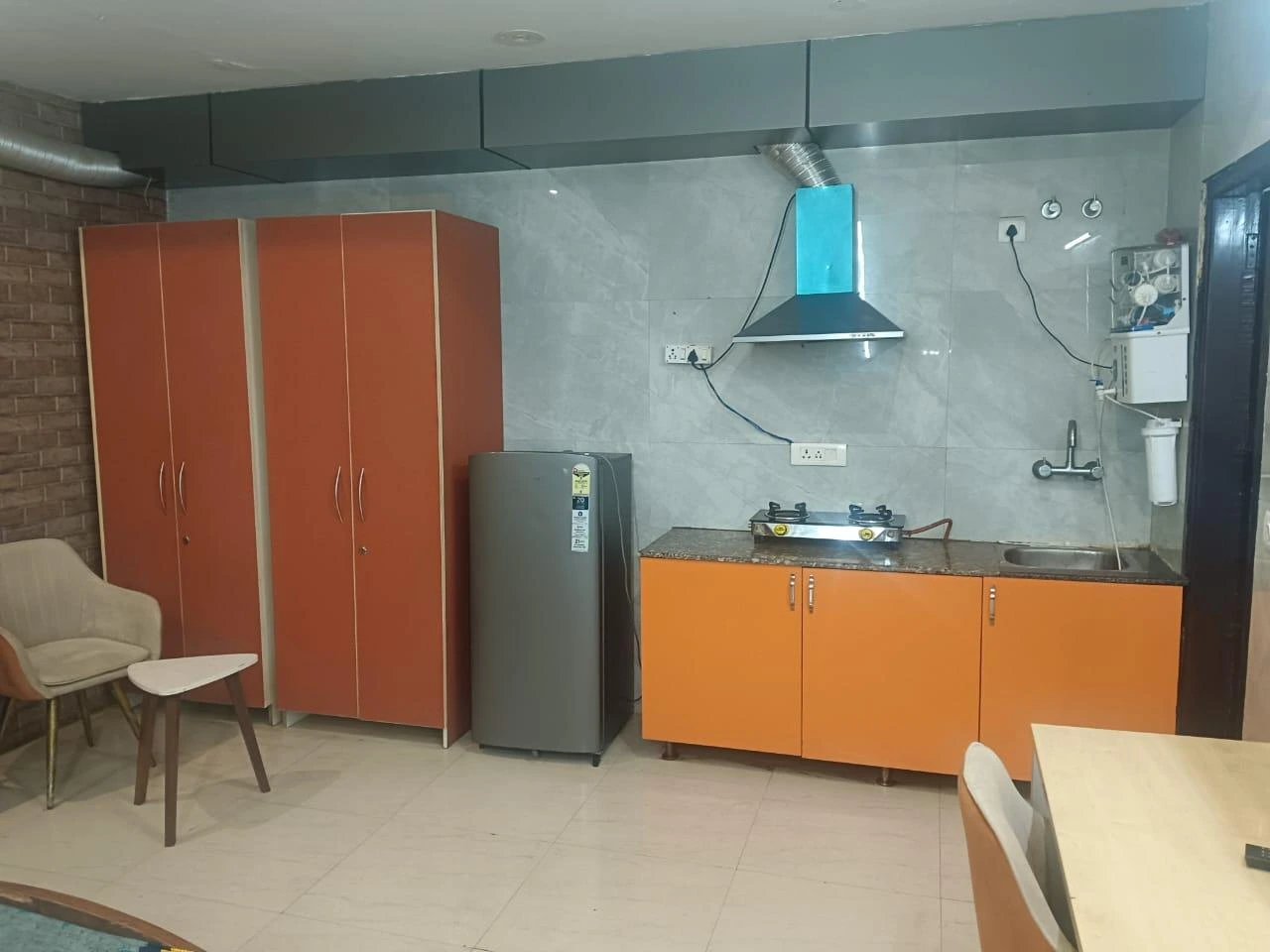 Modern co-living room with comfortable seating and natural lighting